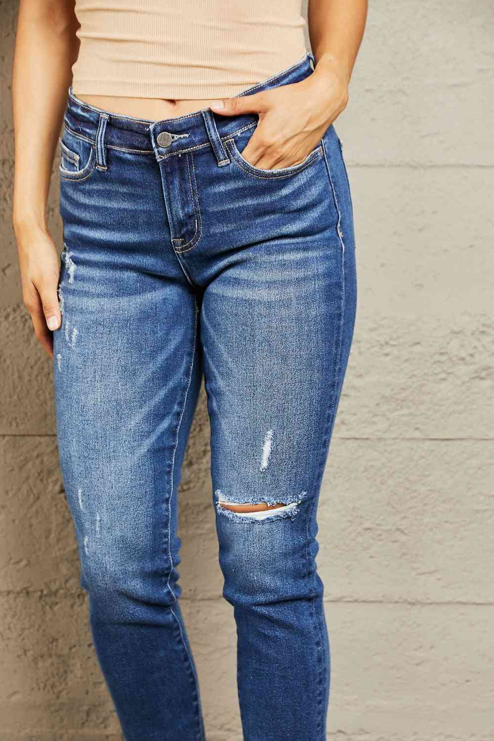 Mid Rise Distressed Slim Jeans