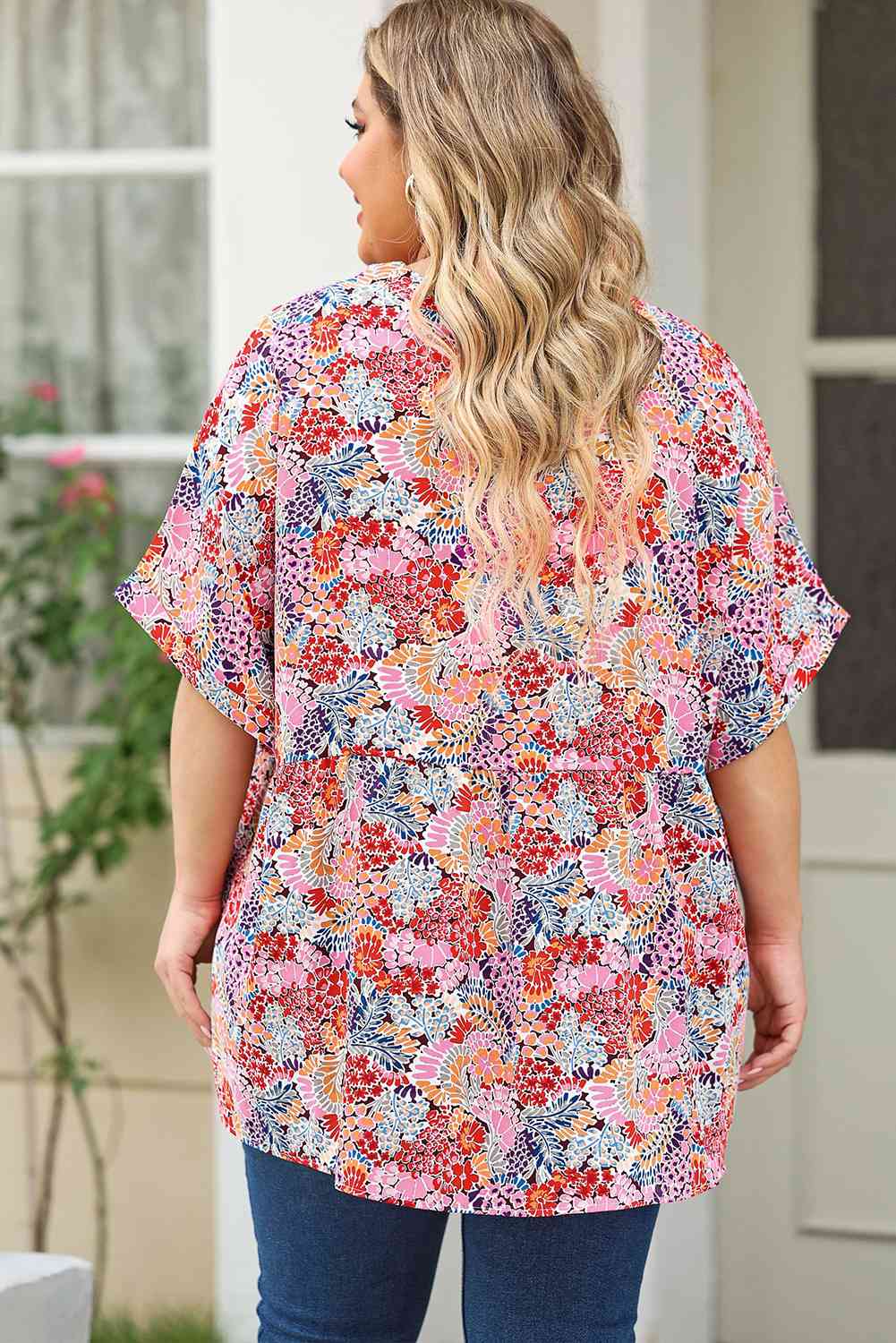 Plus Size Printed Notched Neck Half Sleeve Top