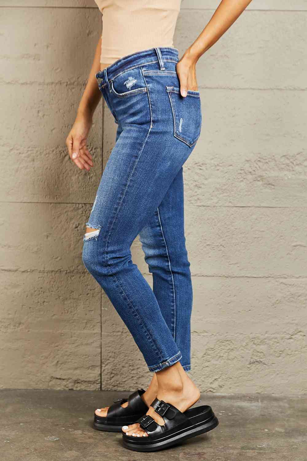 Mid Rise Distressed Slim Jeans