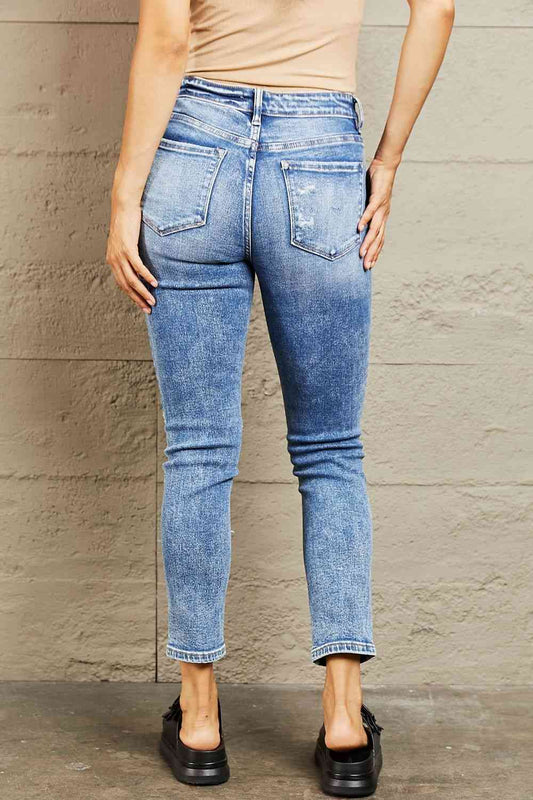 Mid Rise Distressed Skinny Jeans